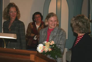 Marjorie Walters receives her award from Tania Werbisky of the state Preservation League. At left is Otsego 2000 Vice President Nicole Dillingham and, in the rear, Executive Director Robin Krawitz.